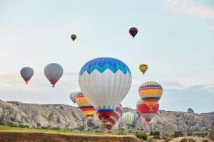 Hot air balloons fly in cappadocia