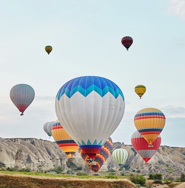 Hot air balloons fly in cappadocia